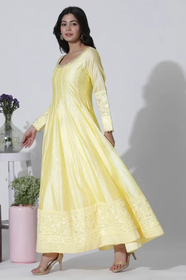 yellow chanderi panelled thread work anarkali kurta, churidar and dupatta set
